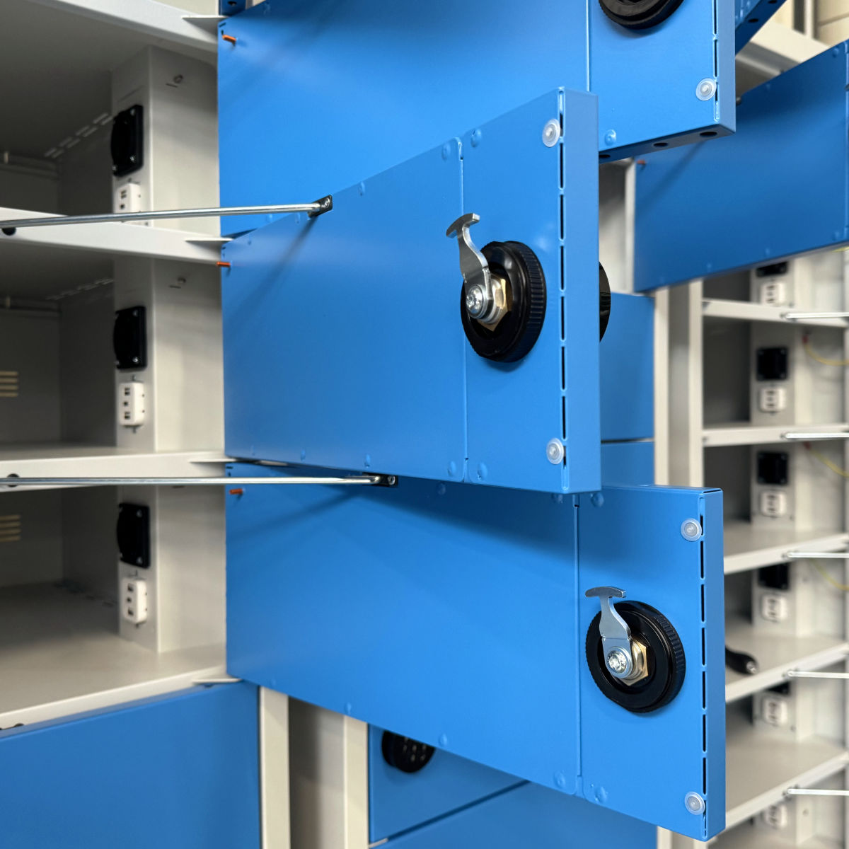 Charging cabinets are secured with an opening angle limiter for added safety